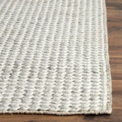 Jeanie Solid Woven Rug - Safavieh